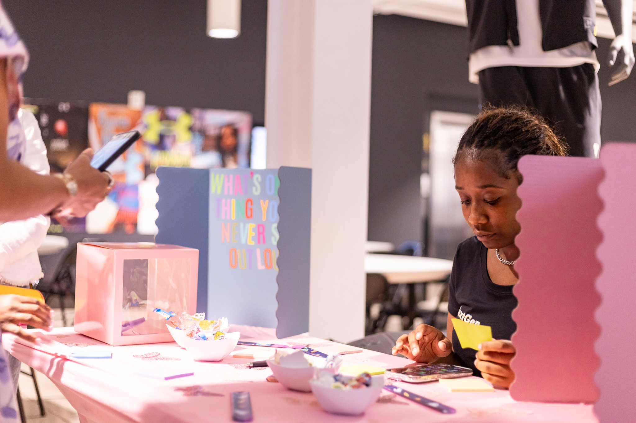 Young people sharing their venture at a showcase booth